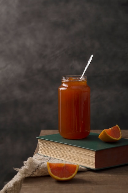 Free photo jar filled with organic homemade orange marmalade