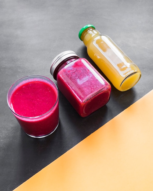 Free photo jar glass and bottle with smoothie