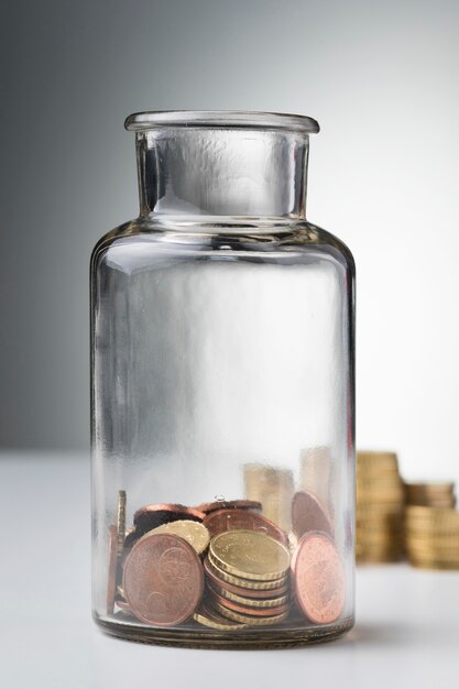 Jar with coins savings