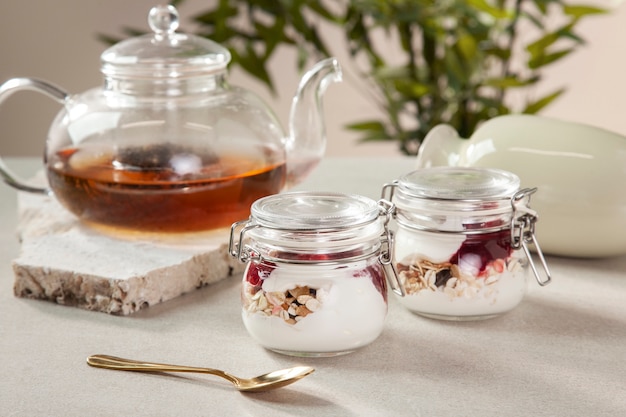 Free Photo jars arrangement with delicious desserts