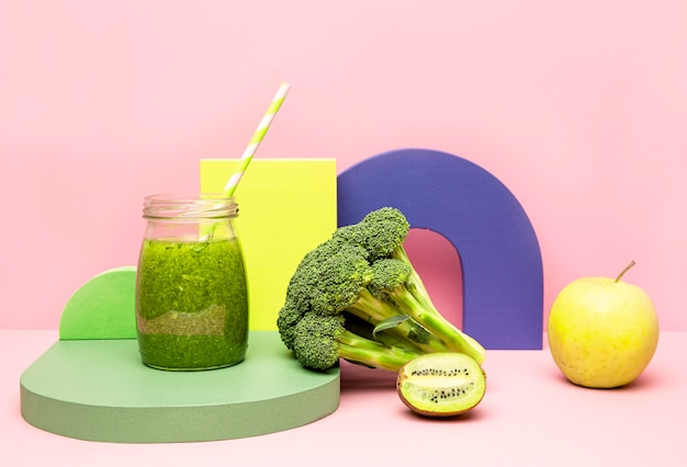 Free photo jars with healthy smoothie of broccoli