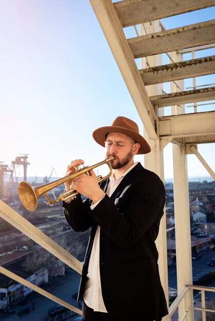 Jazz day with man playing trumpet