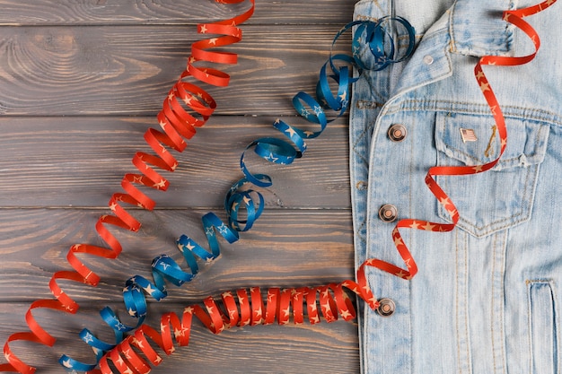 Jean jacket and ribbons on table