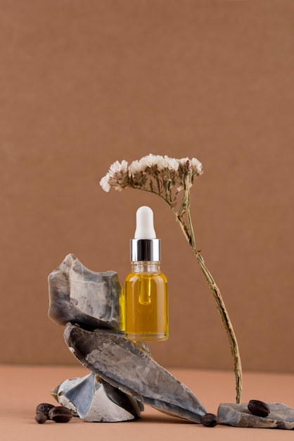 Jojoba oil dropper arrangement