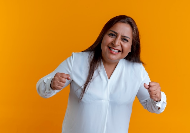 Joyful casual caucasian middle-aged woman showing yes gesture 