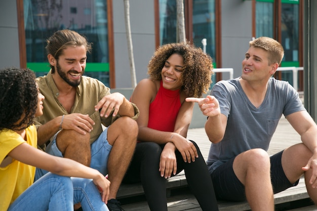 Joyful close friends joking, arguing