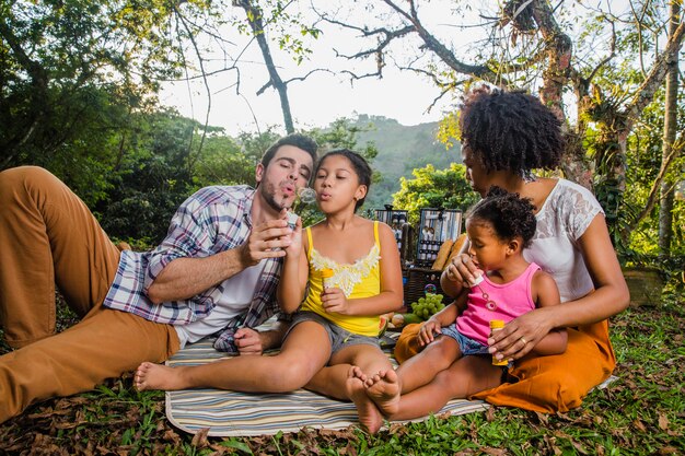 Joyful family in countryside