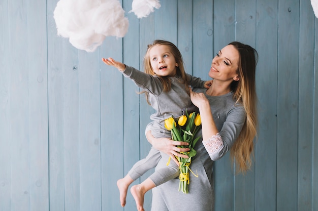 Free photo joyful mother and daughter celebrating mothers day