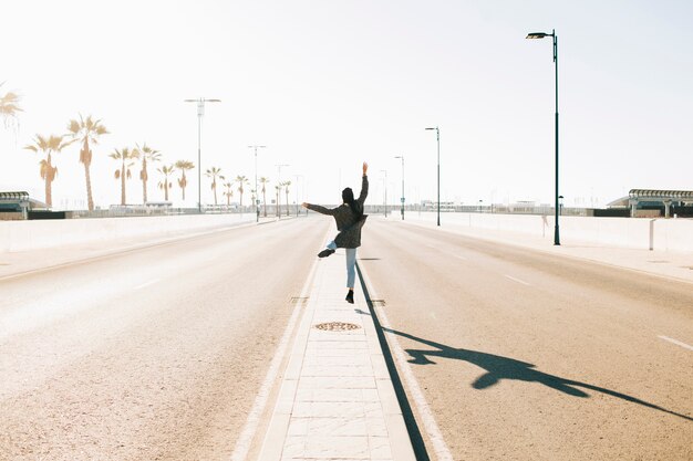 Joyful woman on street