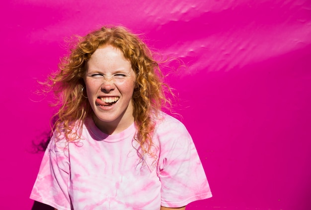 Free photo joyful woman with tongue out