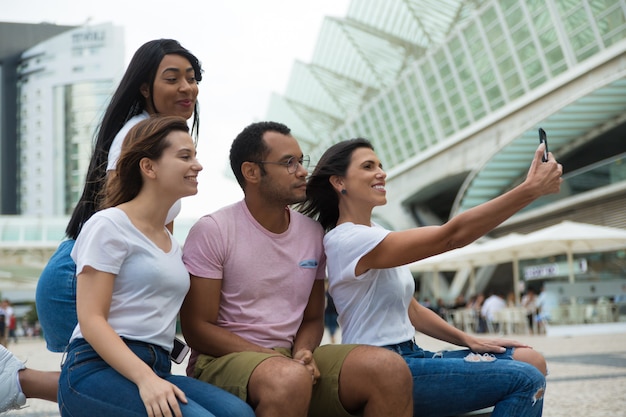 Free photo joyful young people posing for self portrait