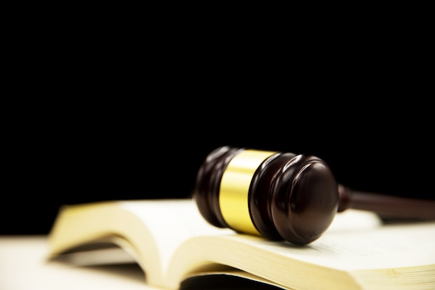 Free photo judges gavel on book and wooden table. law and justice concept background.