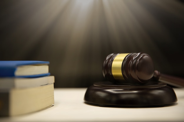 Free photo judges gavel and book on wooden table. law and justice concept background.