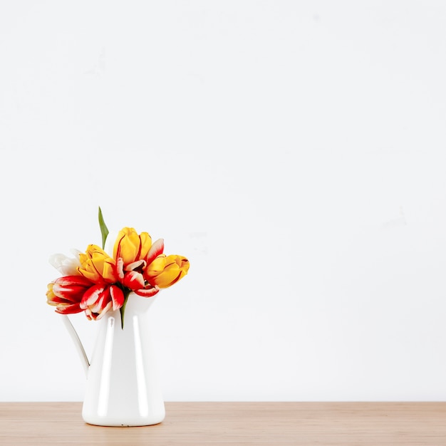 Free Photo jug with lovely flowers