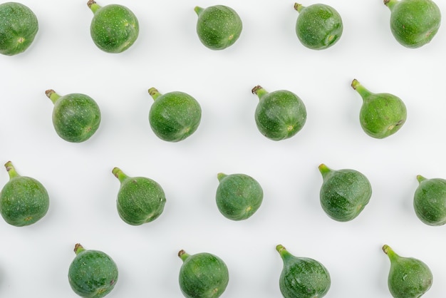 Juicy figs on a white wall. flat lay.