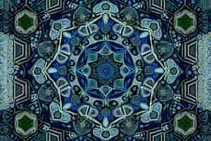 Free photo a kaleidoscope of blue and green colors is displayed in a mosaic pattern.