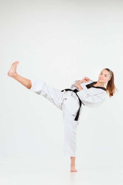 Free photo the karate girl with black belt