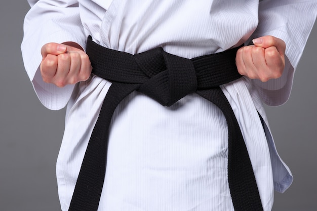 Free photo karate girl with black belt