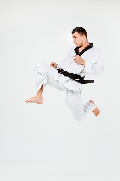 Free photo the karate man with black belt