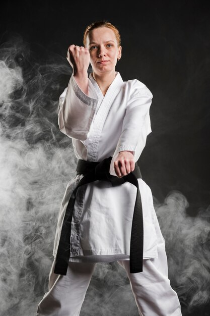 Karate woman posing front view