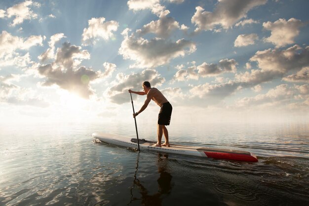 Kayaking Man paddling a kayak Canoeing paddling