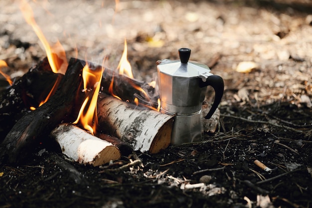 Free photo kettle on bonfire