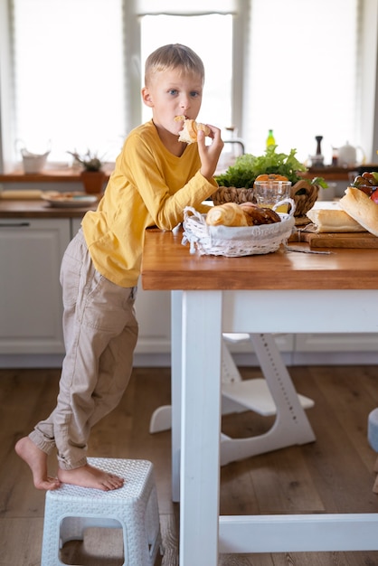 Kid cooking and having fun at home