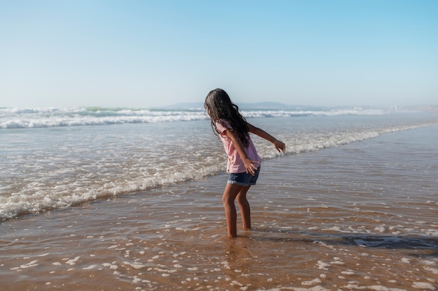 Kid having fun at the beach