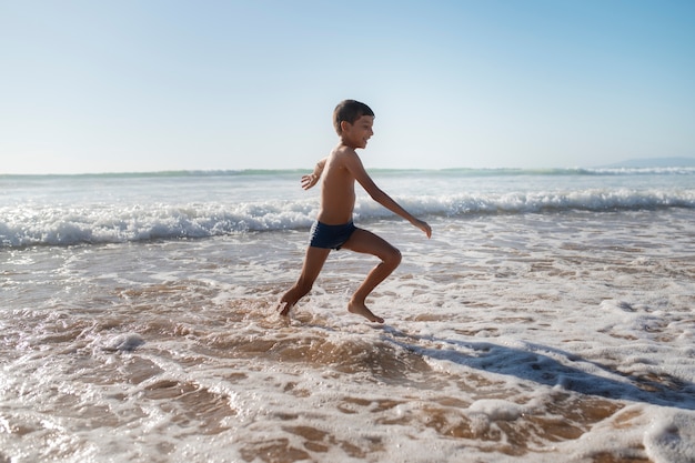 Kid having fun at the beach