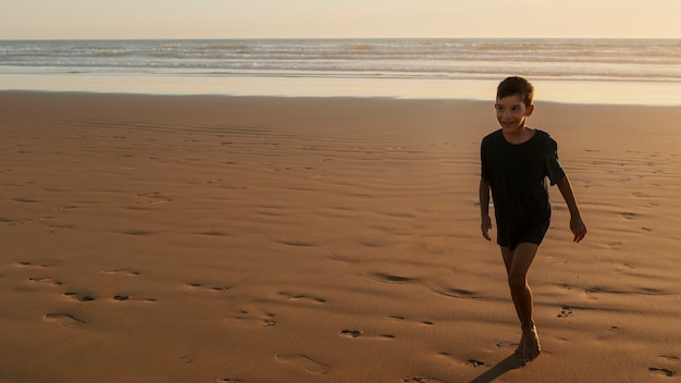 Kid having fun at the beach