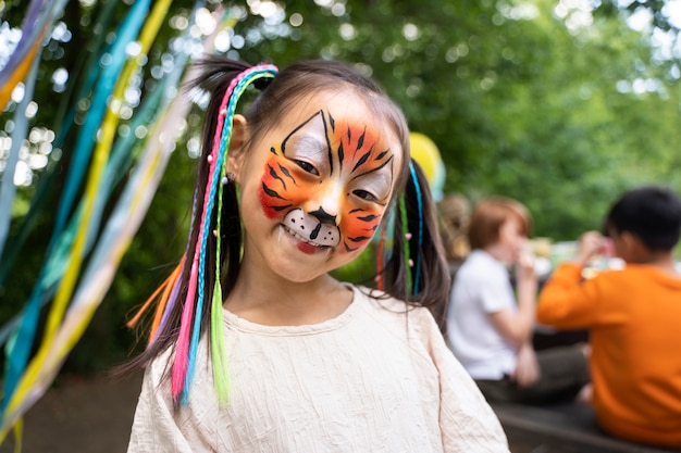 Kid having fun at jungle party