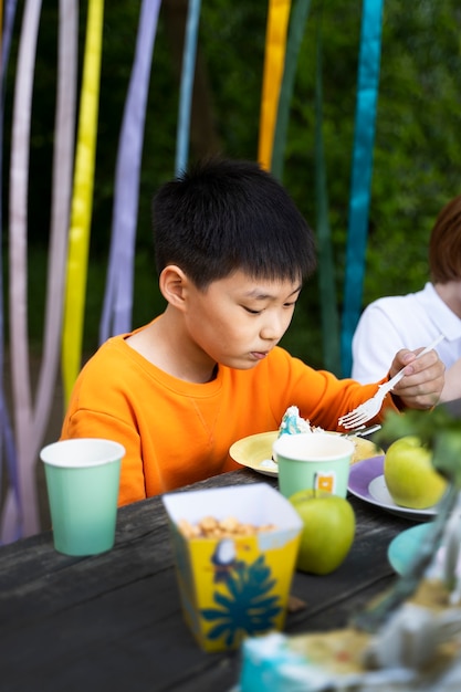 Kid having fun at jungle party