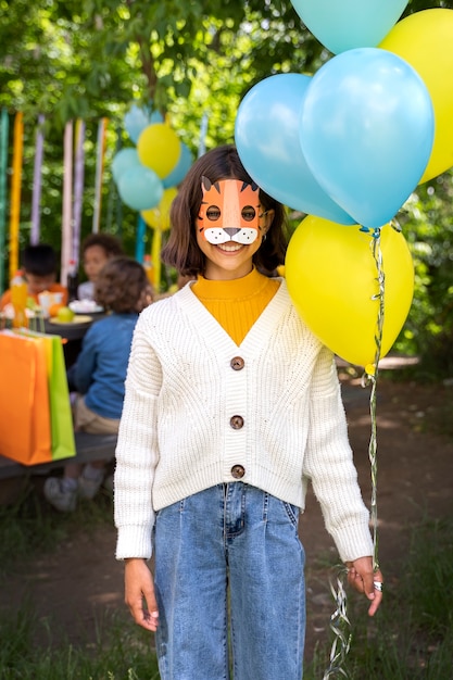 Free photo kid having fun at jungle party