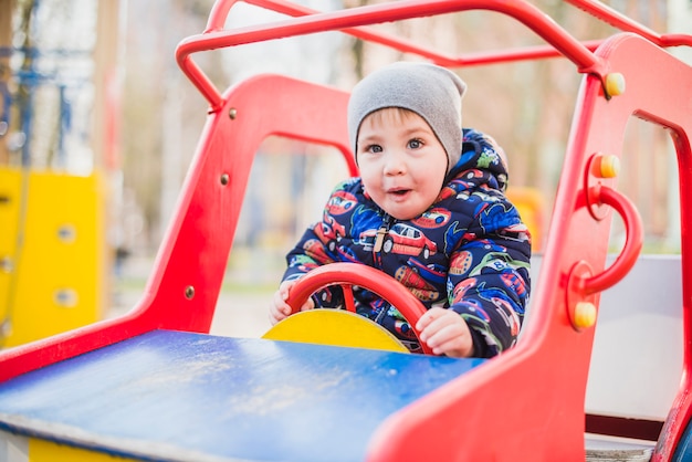 Kid playing outside on playground