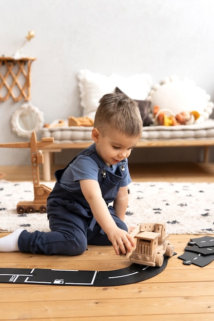 Free photo kid playing in their room