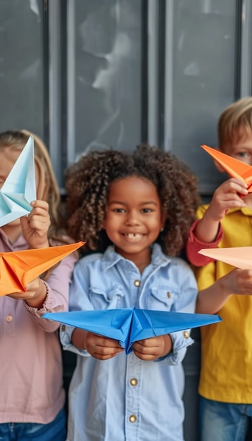 Free photo kid playing with paper plane