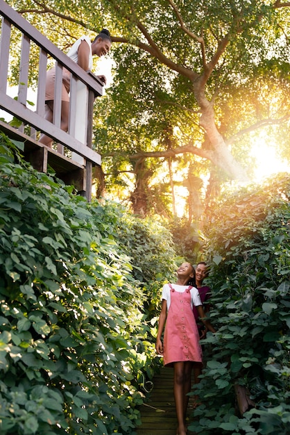 Free photo kid walking in the backyard