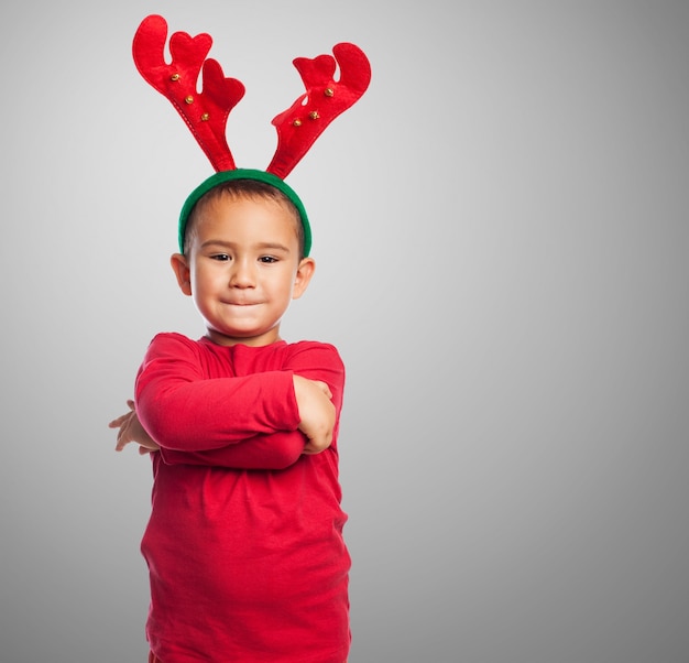 Free Photo kid with plush reindeer antlers