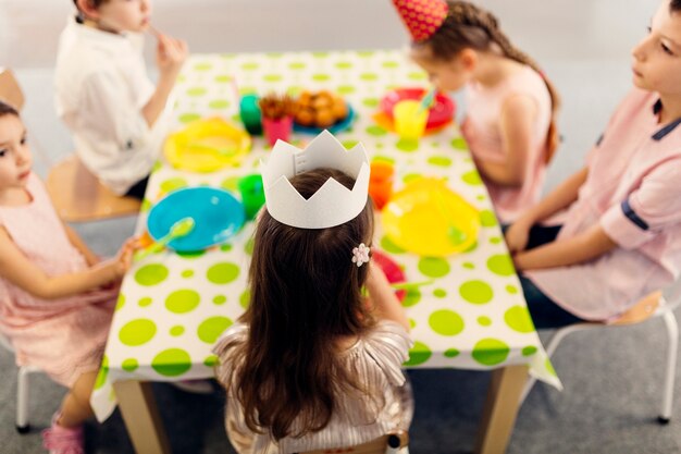 Free Photo kids celebrating birthday side view