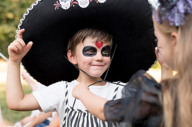 Free photo kids celebrating halloween together