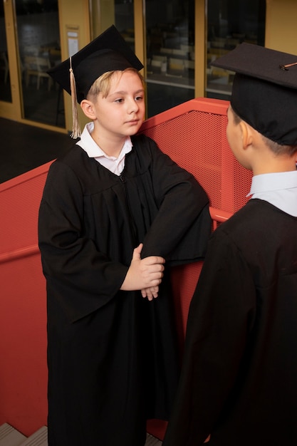 Kids celebrating kindergarten graduation