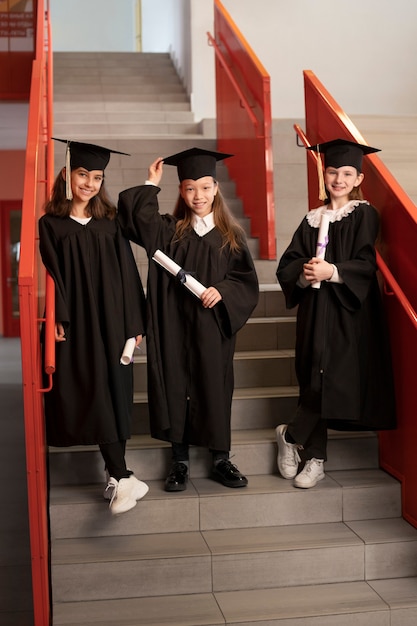 Kids celebrating kindergarten graduation