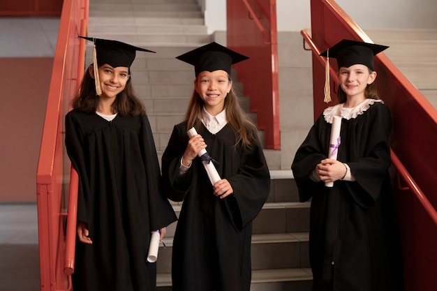 Kids celebrating kindergarten graduation