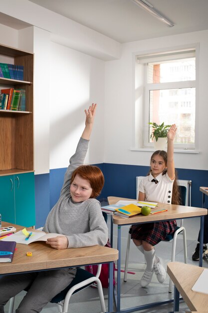 Kids in classroom taking english class