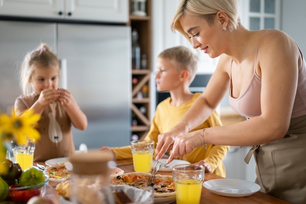 Free photo kids cooking and having fun at home