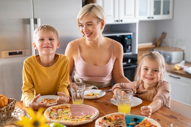 Free photo kids cooking and having fun at home