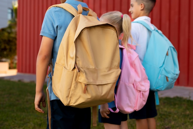 Free Photo kids getting back to school together