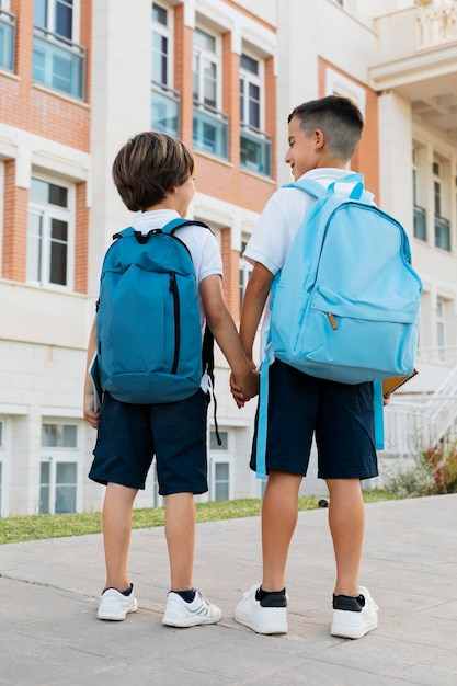 Free Photo kids getting back to school together