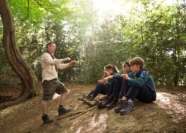 Free photo kids having fun as boy scouts