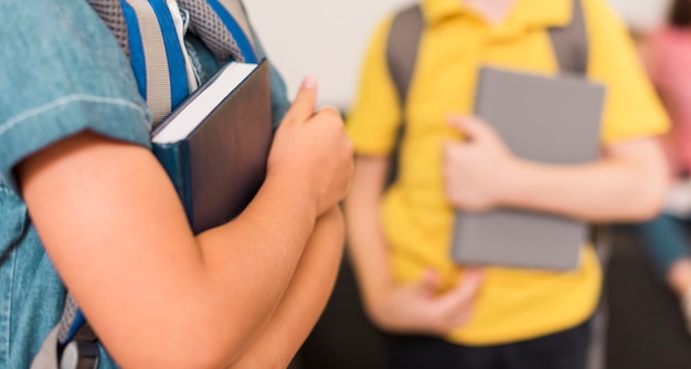 Kids holding their books